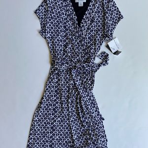 Navy blue and white faux wrap dress